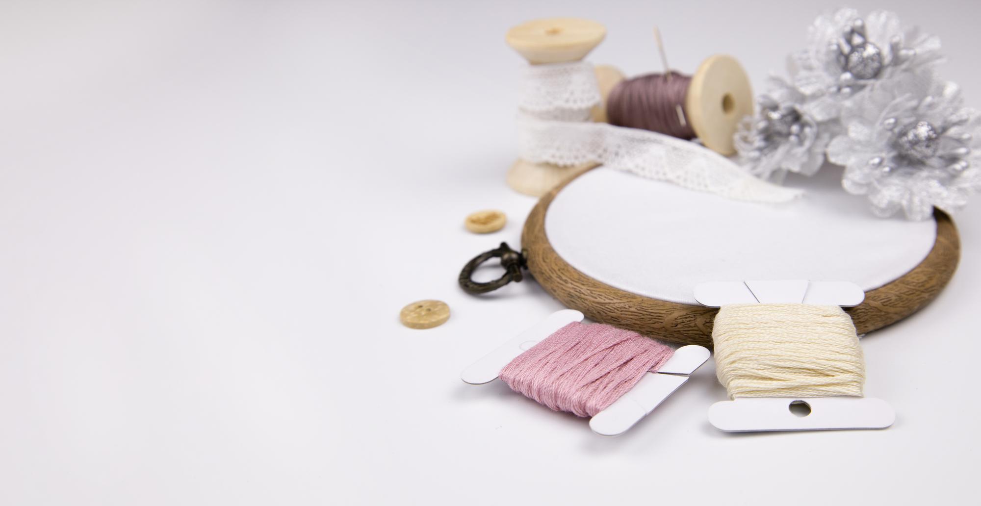 workbench with hoop and needle in soft light